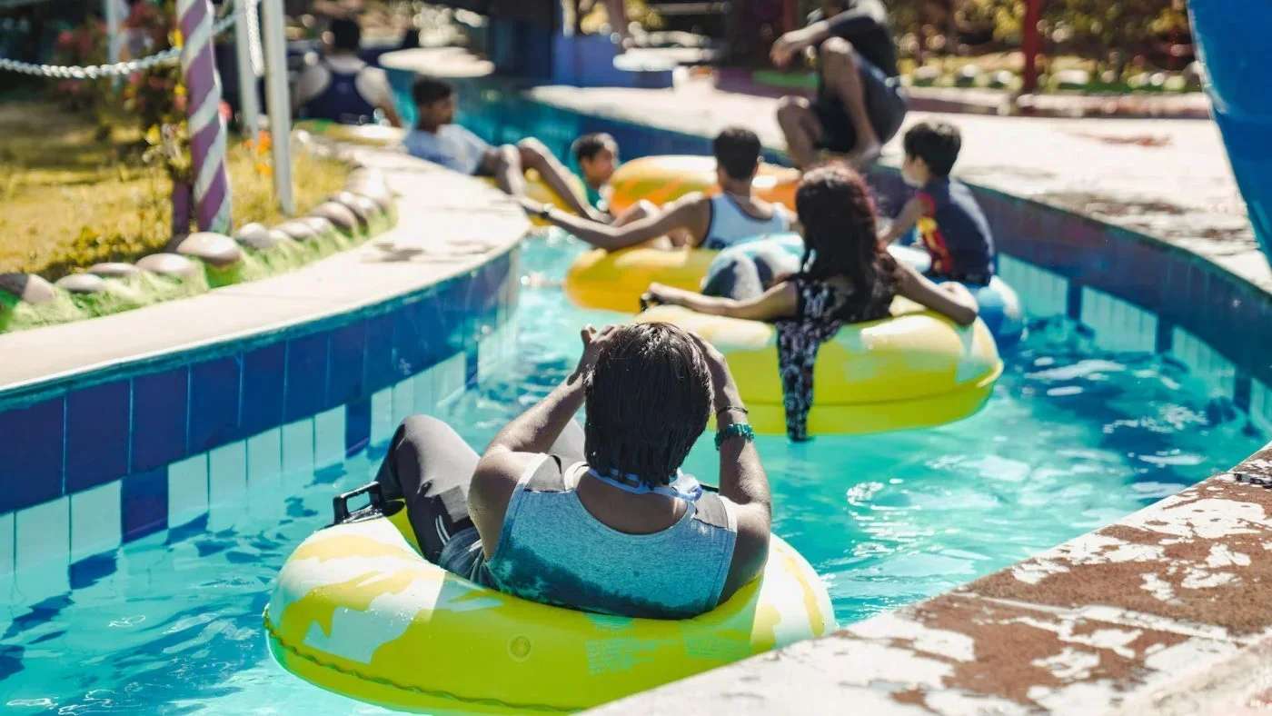 Visitor enjoying the water slide at Funworld