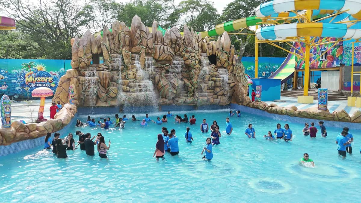 Groups splashing around in the waterfall lagoon