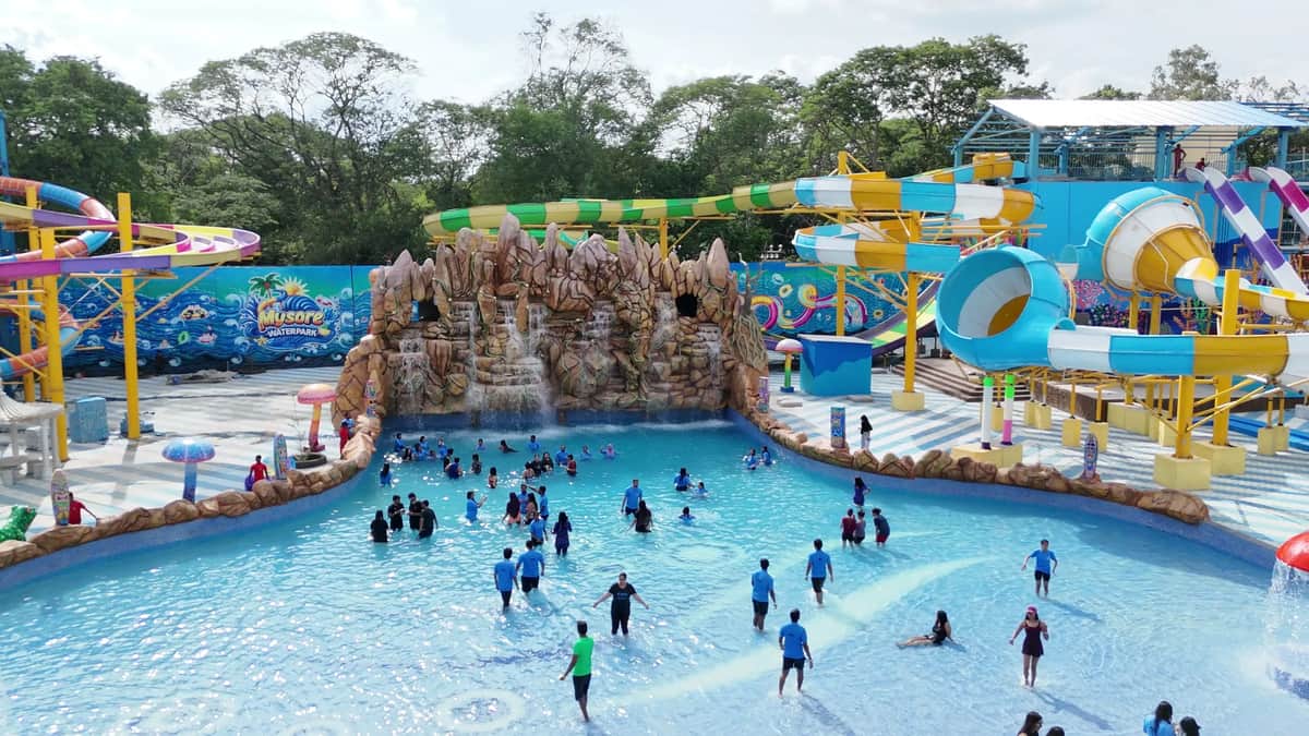 Drone shot of the wave pool with the tube slides behind it