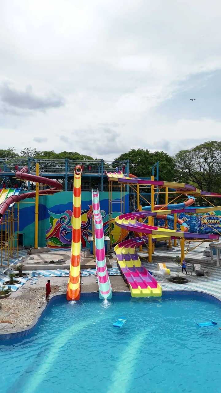 The colourful slide tower and splash pool at Mysore Water Park